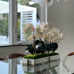 Marble tray on metal stand with mini-phaleanopsis orchid garden
